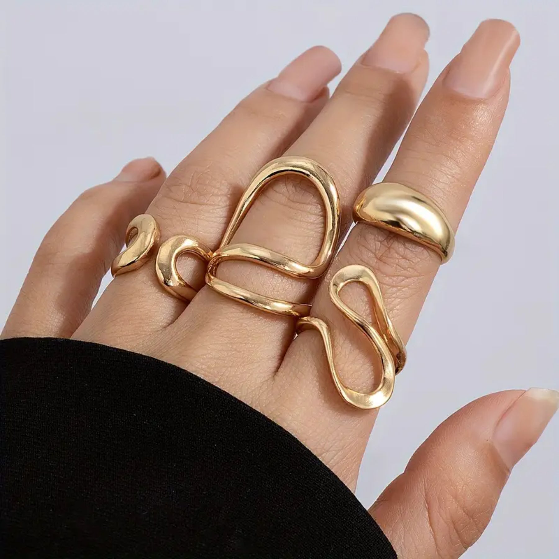 Adjustable Gold-Plated Wave Design Rings Set- 4 Pieces