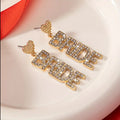 Dazzling Heart-Shaped "Bride" Dangle Earrings - Paved Rhinestones