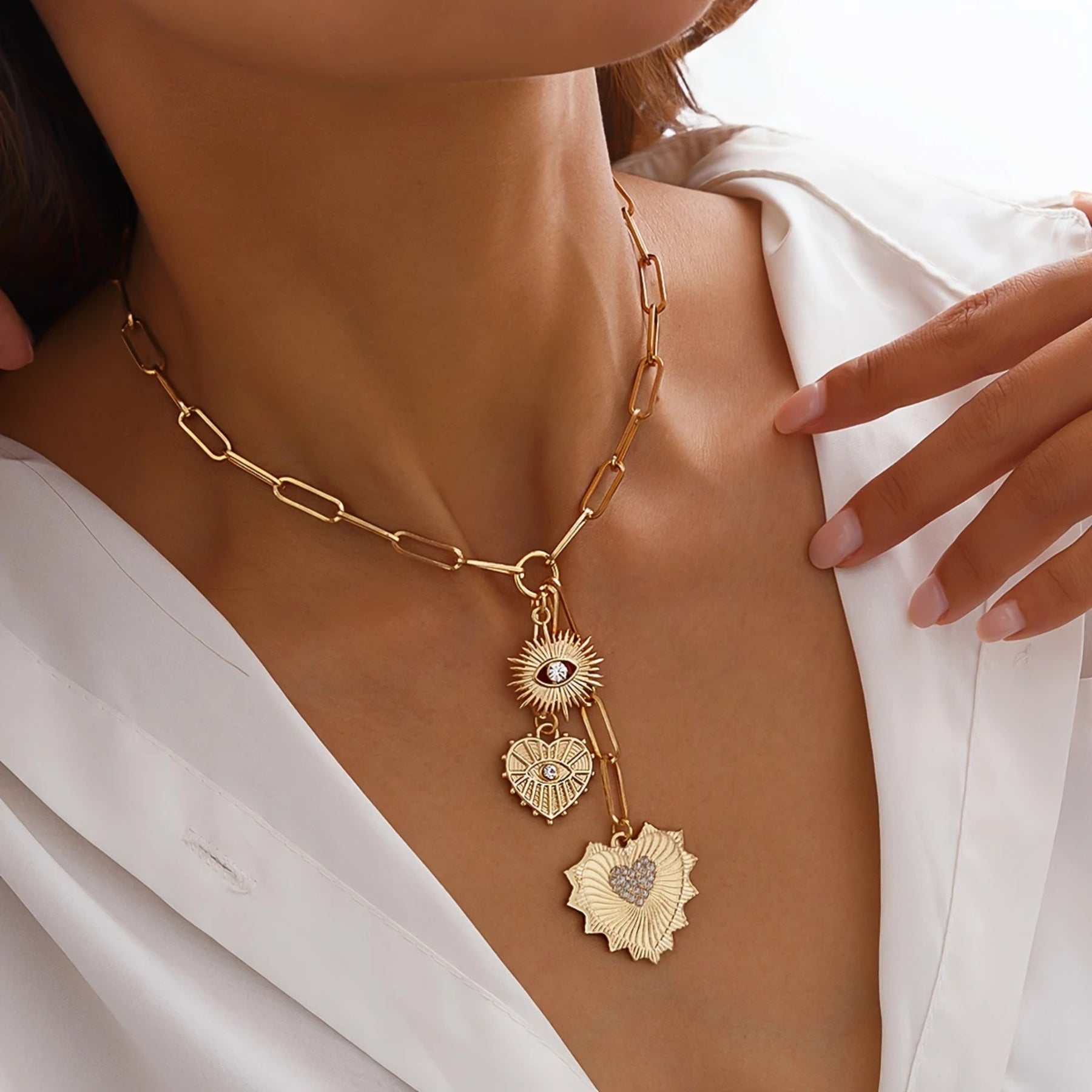 A Heart-shaped Pendant Necklace With Golden Eyes
