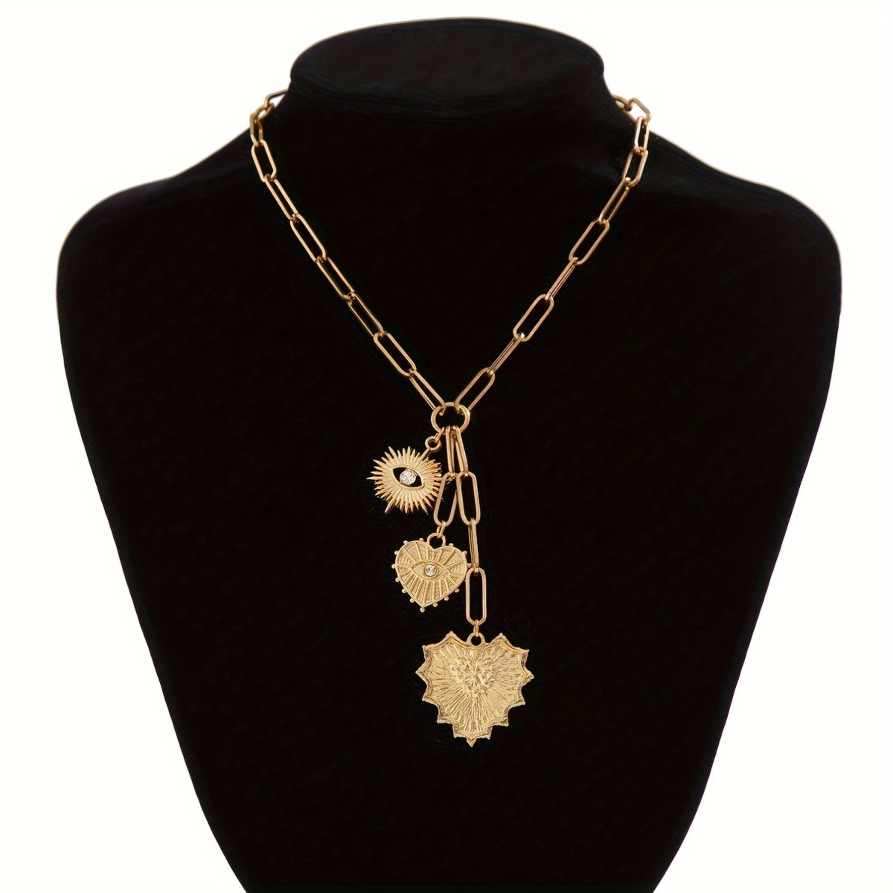 A Heart-shaped Pendant Necklace With Golden Eyes