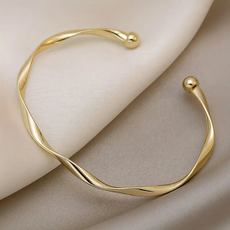 Elegant Adjustable Golden Twist Bangle Bracele